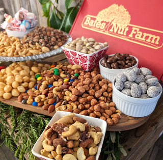 Nuts and sweets on a wooden board.